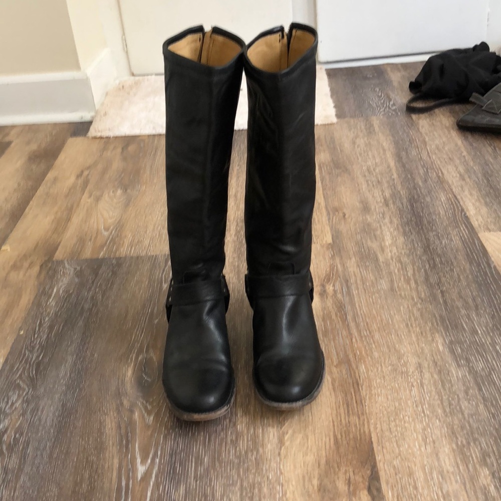 Tall black leather boot